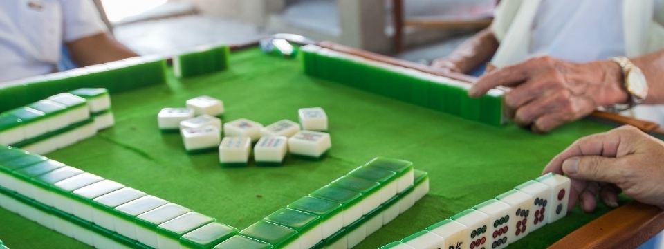 Mahjong, the tile based game and its regional variants